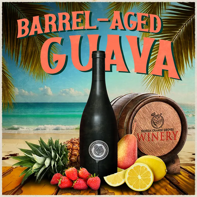 Barrel-aged guava wine bottle with tropical fruits and barrel on a beach background