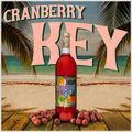 Cranberry Key bottle with cranberries on a beach background