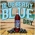 Bottle of Blueberry Blue Dry wine with blueberries on a beach-themed background