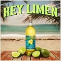 Bottle of Key Lime wine with limes on a beach setting