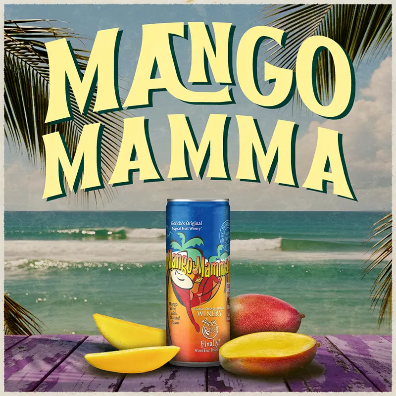 Mango Mamma can with mangoes on a beach background