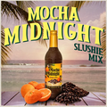 Bottle of Mocha Midnight slushie mix with oranges and coffee beans on a beach setting