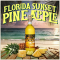 Bottle of Florida Sunset Pineapple wine with pineapple slices and a beach scene in the background