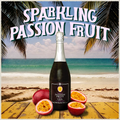 Bottle of sparkling passion fruit wine on a beach with palm trees and ocean in the background.