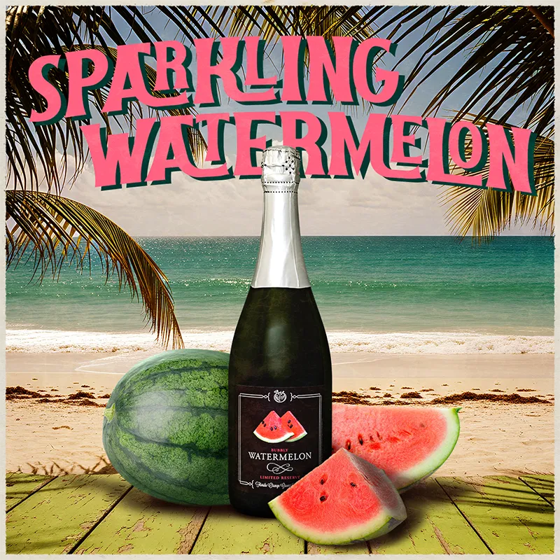 Bottle of sparkling watermelon wine with watermelons on a beach background
