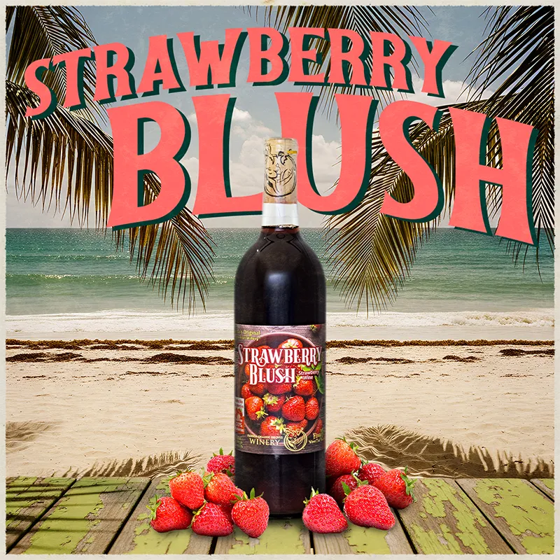 Bottle of Strawberry Blush wine with strawberries on a beach background