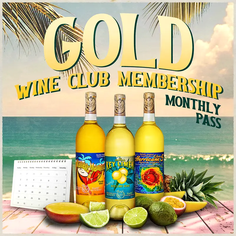 Wine bottles with colorful labels on a table with fruit, calendar, and scenic background.